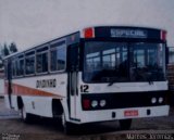 Dindinho Transportes 12 na cidade de Tramandaí, Rio Grande do Sul, Brasil, por Marcos Jeremias. Número da foto: #:id.
