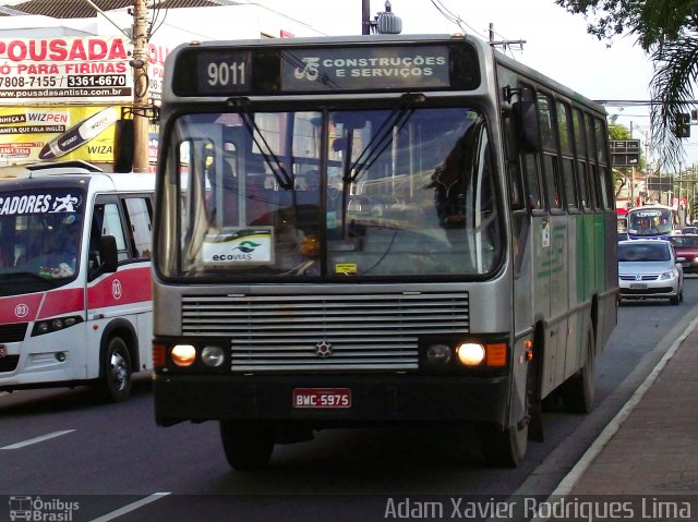Ônibus Particulares 9011 na cidade de Cubatão, São Paulo, Brasil, por Adam Xavier Rodrigues Lima. Número da foto: #2064973.